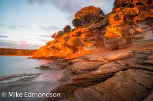 Brightly lit Painted Cliffs. Maria Island